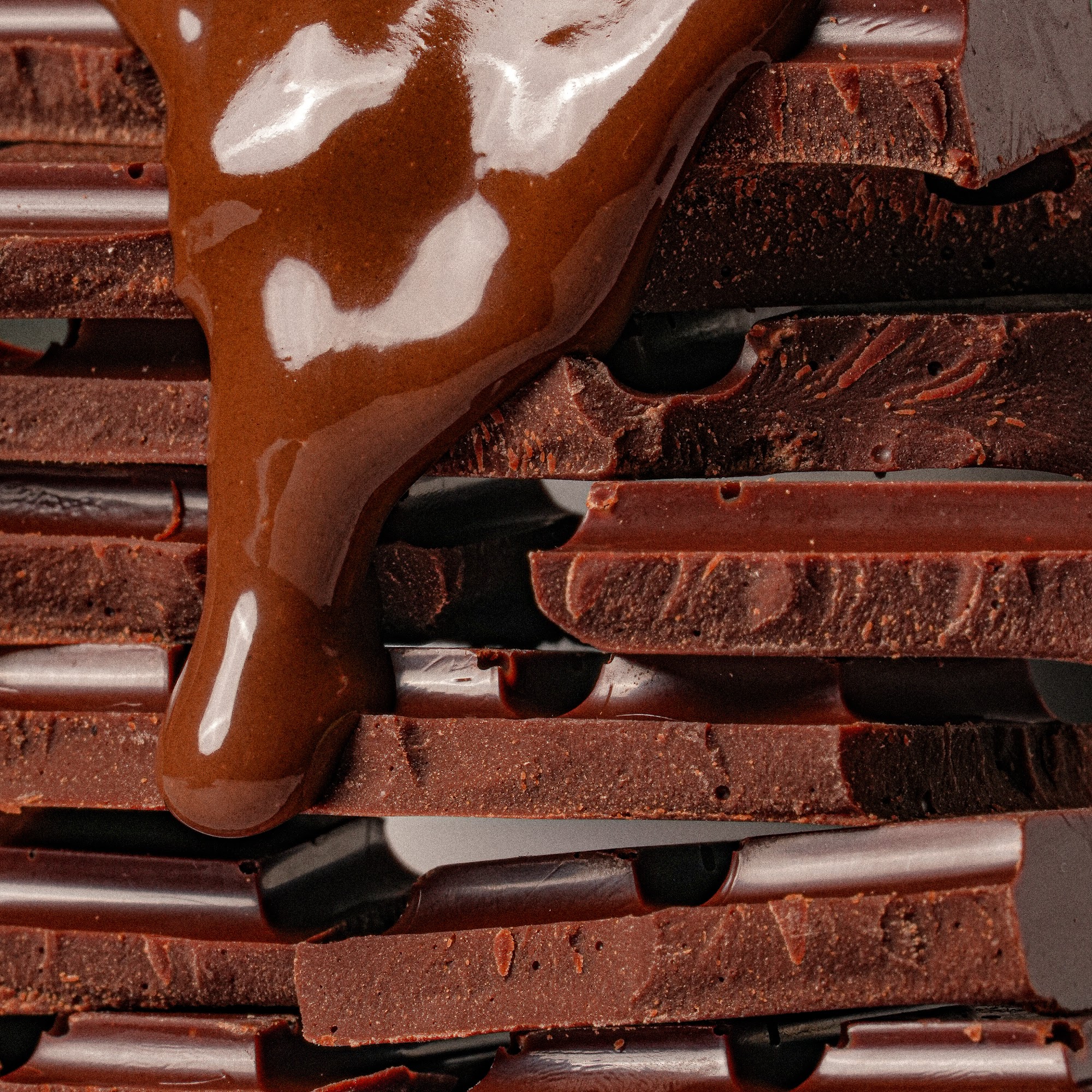 Chocolate being spread by hand